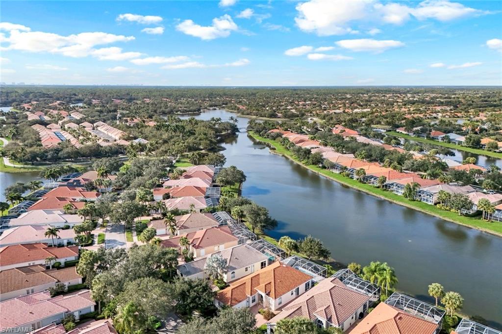 3787 Whidbey Way Naples, FL 34119 - Photo 5 of 50 an aerial view of a city with lake view