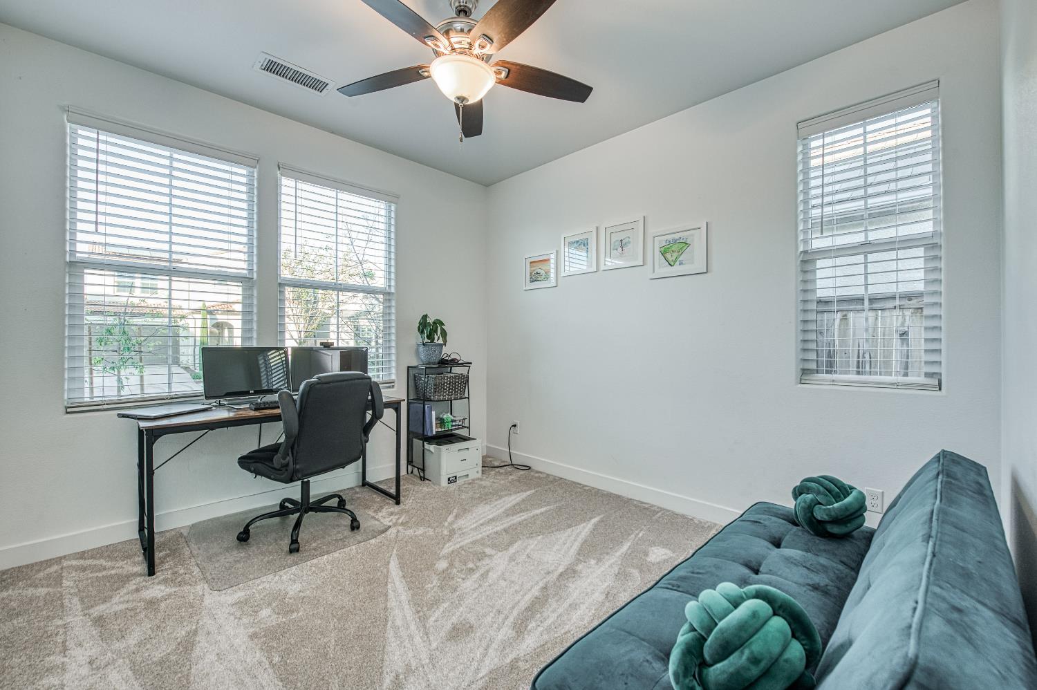 4534 Hillside Road Madera, CA 93636 - Photo 14 of 92 a view of a livingroom with workspace and a window