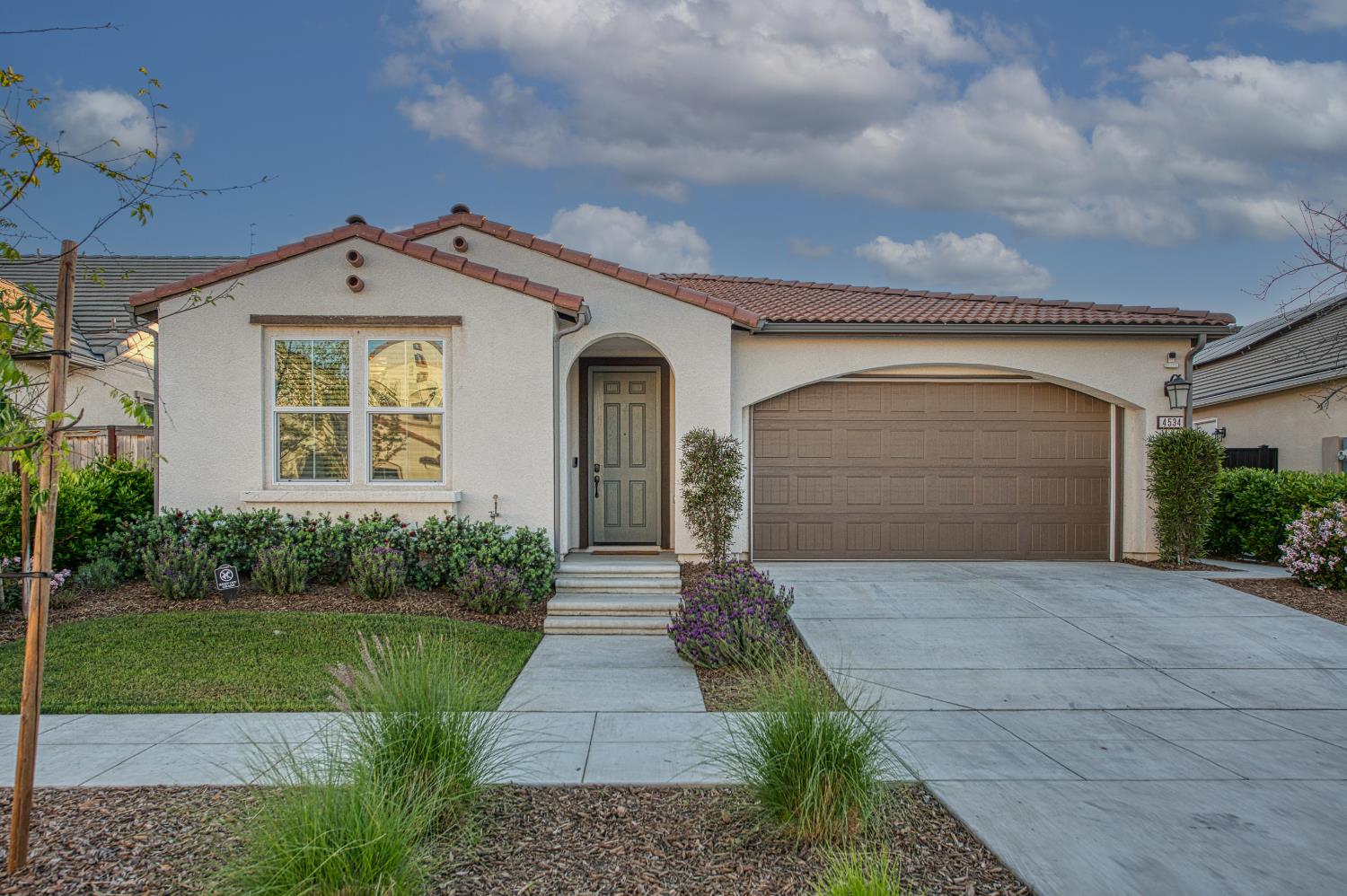 4534 Hillside Road Madera, CA 93636 - Photo 2 of 92 a front view of a house with a yard