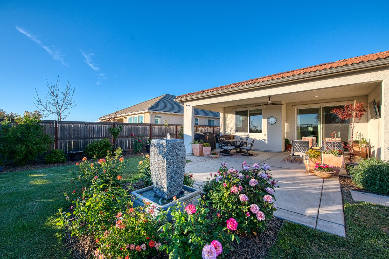4534 Hillside Road Madera, CA 93636 - Photo 58 of 92 a front view of a house with a garden