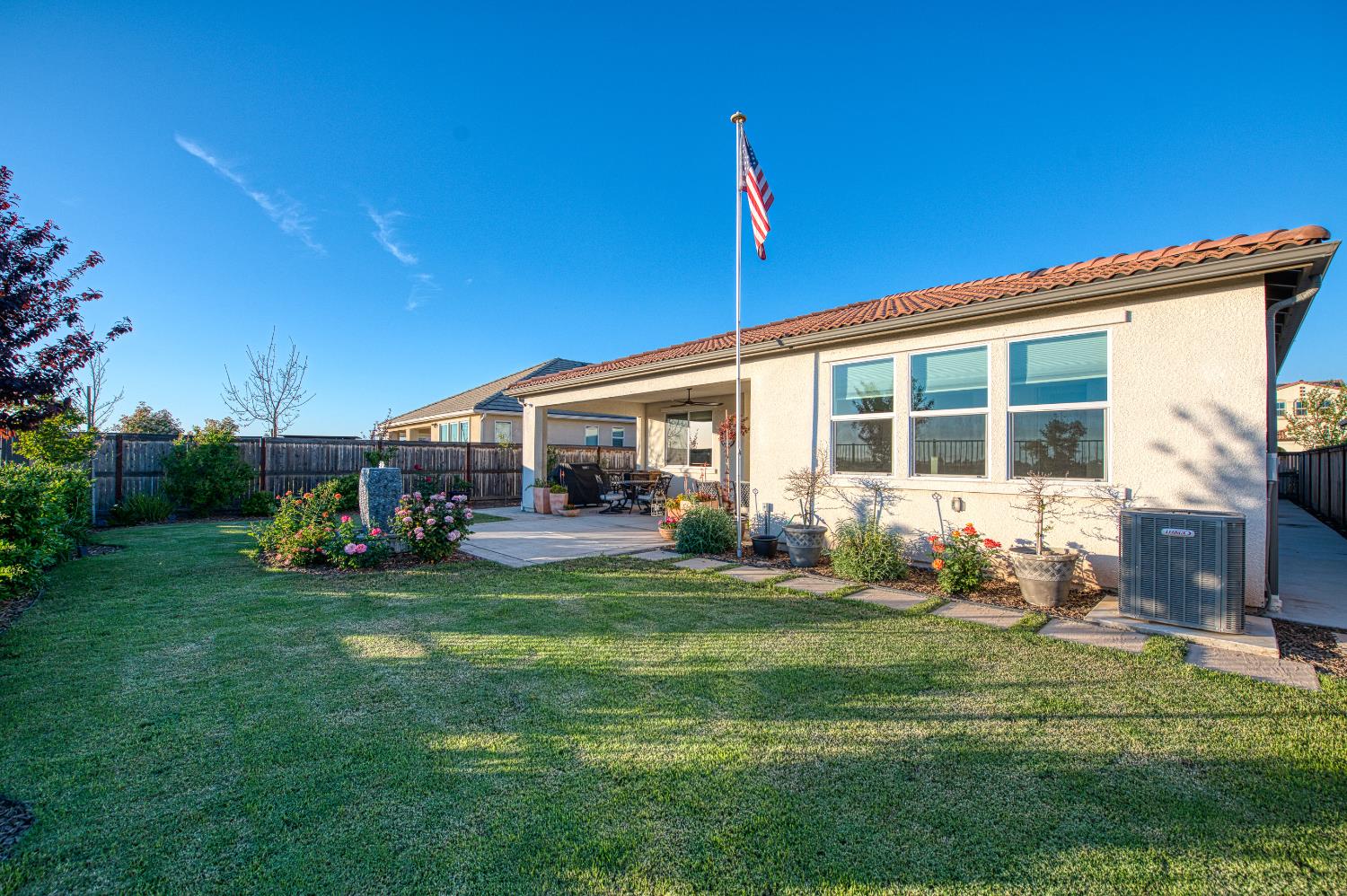 4534 Hillside Road Madera, CA 93636 - Photo 59 of 92 a view of a house with backyard porch and sitting area