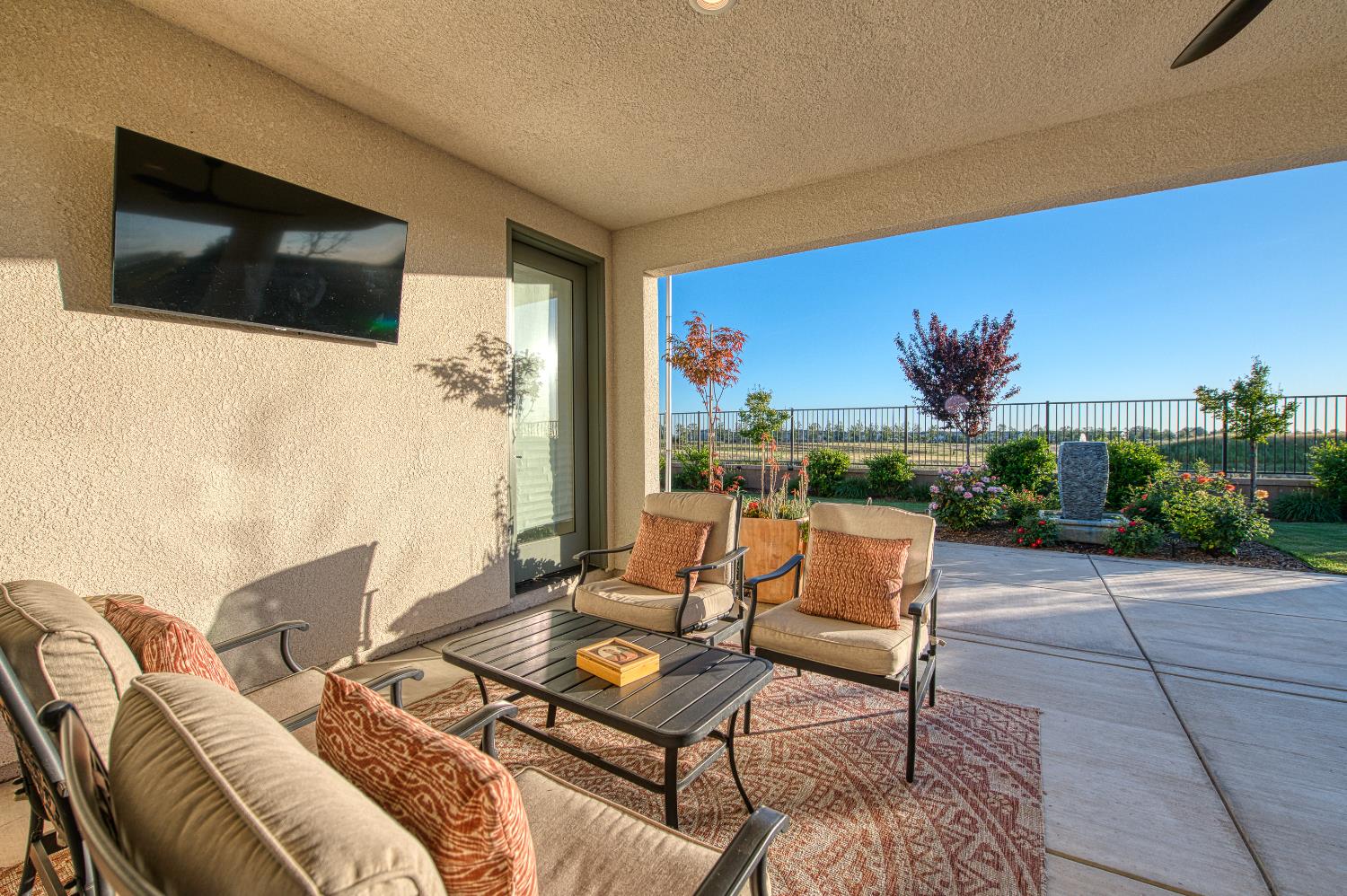 4534 Hillside Road Madera, CA 93636 - Photo 82 of 92 a outdoor living space with furniture and a flat screen tv
