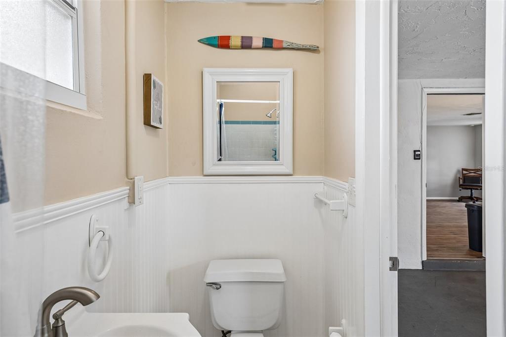 7215 Mayfield Drive Port Richey, FL 34668 - Photo 45 of 52 a bathroom with a toilet and a sink