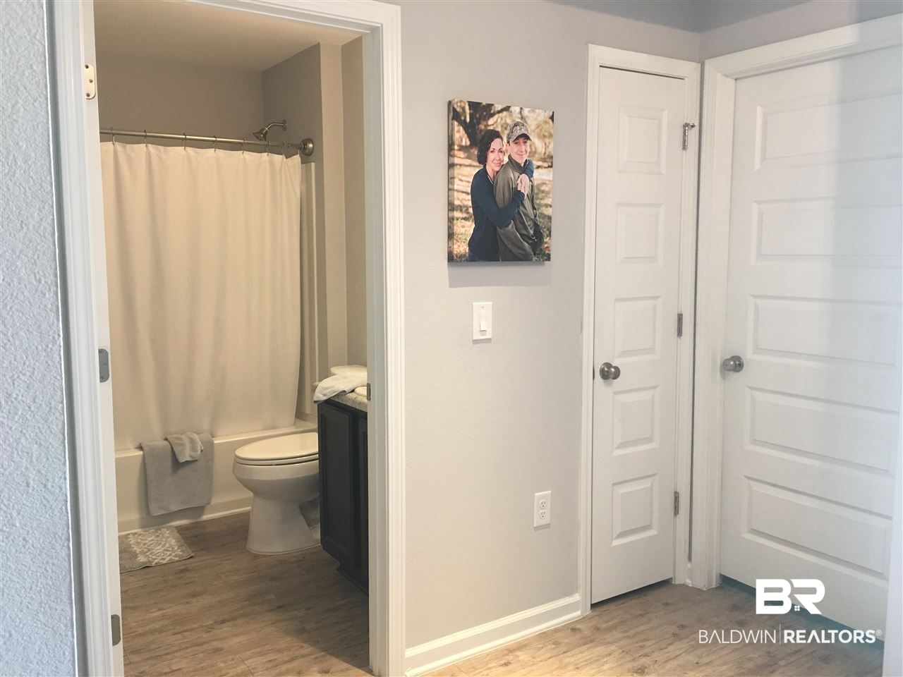 17316 Lewis Smith Drive Foley, AL 36535 - Photo 8 of 21 Hallway between Bedroom 2
