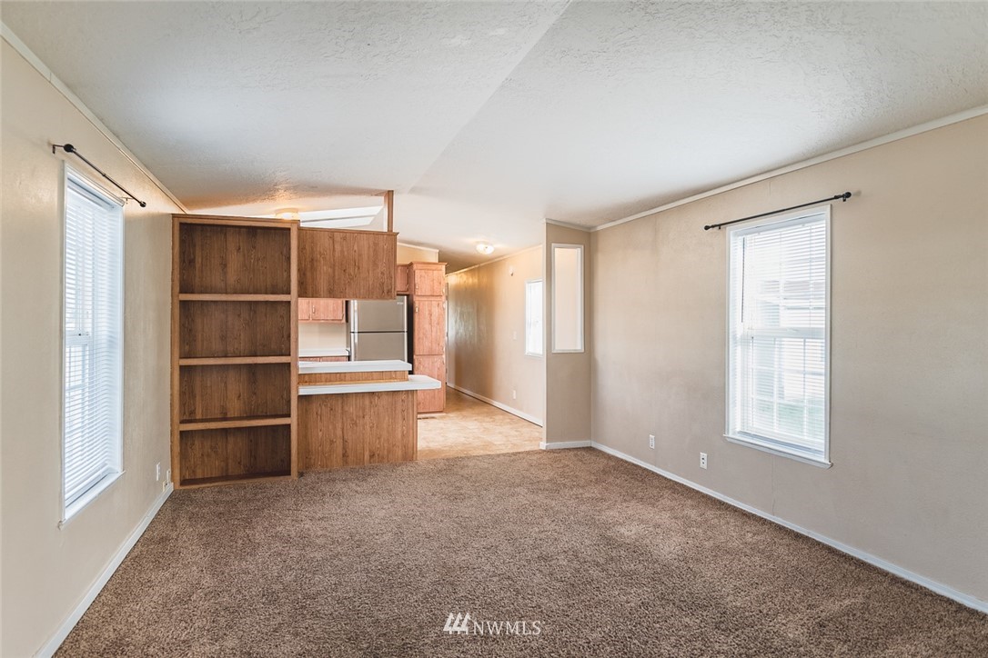 4727 Owens Road Northeast, Unit 20 Moses Lake, WA 98837 - Photo 2 of 36 a view of an empty room with a window