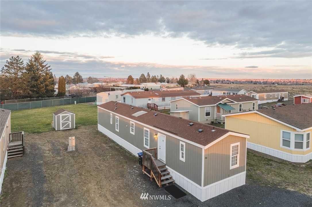 4727 Owens Road Northeast, Unit 20 Moses Lake, WA 98837 - Photo 36 of 36 an aerial view of a house with a yard basket ball court and outdoor seating