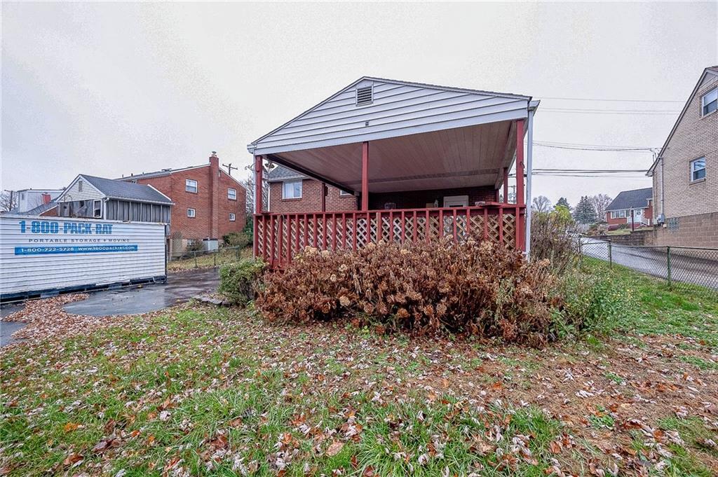609 Regency Drive Pittsburgh, PA 15239 - Photo 4 of 32 a front view of a house with garden