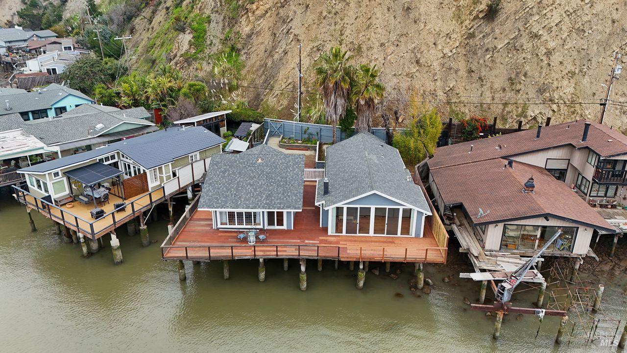 34 Sandy Beach Road Vallejo, CA 94590 - Photo 3 of 63 an aerial view of a house with swimming pool and sitting area