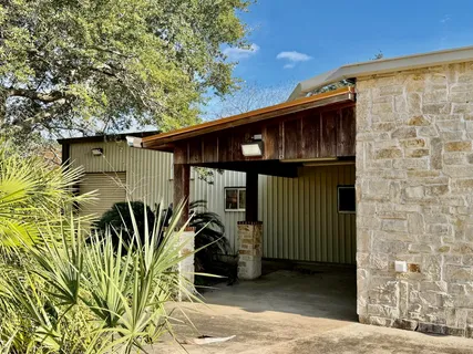 a front view of a house having patio