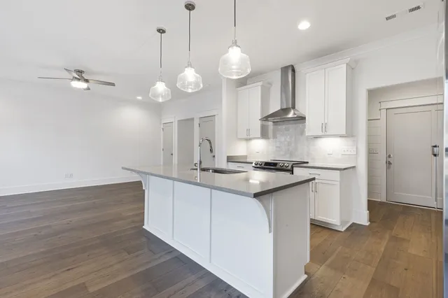 a view of an empty room with glass door