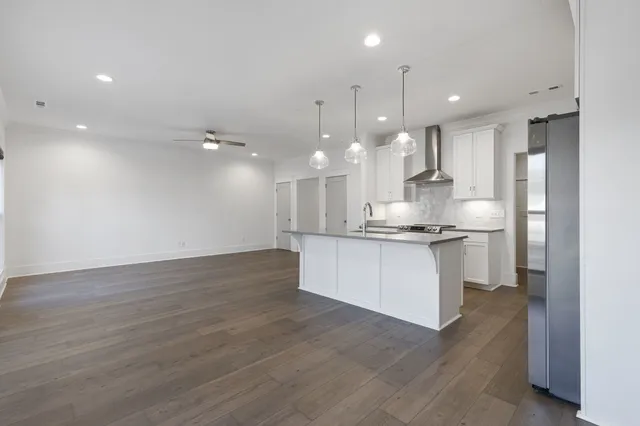 a bathroom with a sink a mirror and a toilet
