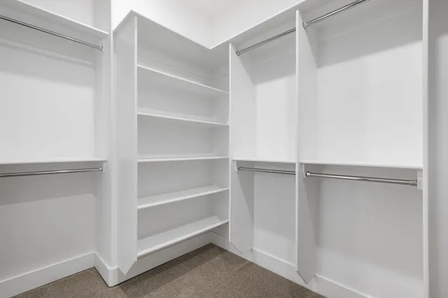 a view of yard with swimming pool and green space