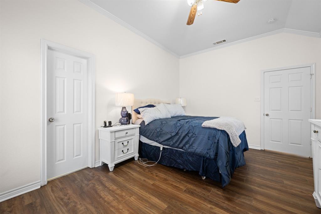 7 St Charles Place Midlothian, TX 76065 - Photo 17 of 27 a spacious bedroom with a bed and a dresser