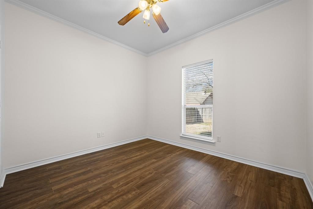 7 St Charles Place Midlothian, TX 76065 - Photo 20 of 27 an empty room with wooden floor and windows