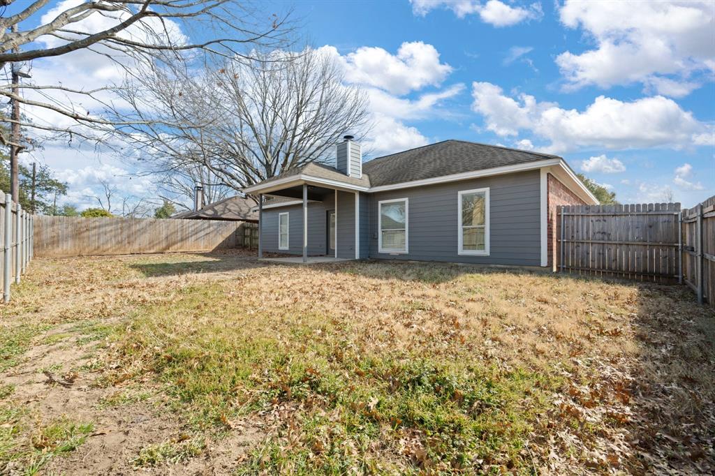 7 St Charles Place Midlothian, TX 76065 - Photo 26 of 27 a front view of a house with a yard