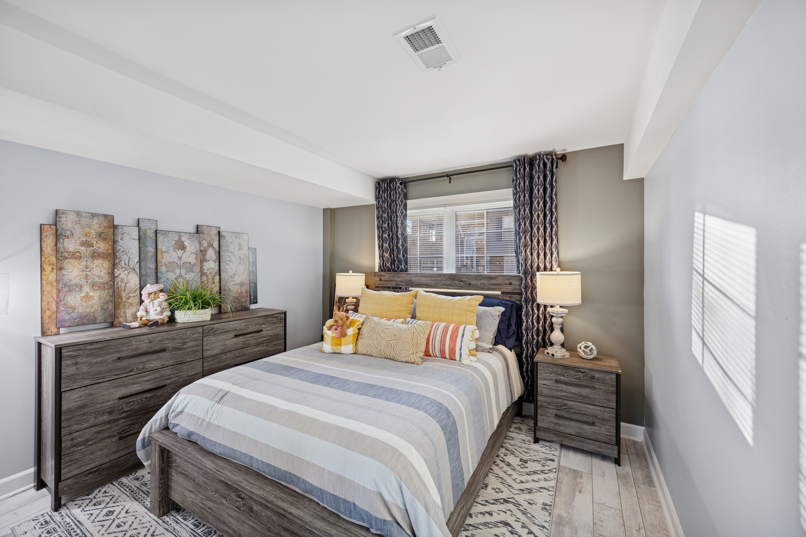 7616 West Saint Francis Road Frankfort, IL 60423 - Photo 13 of 16 a bedroom with a large bed and a large window