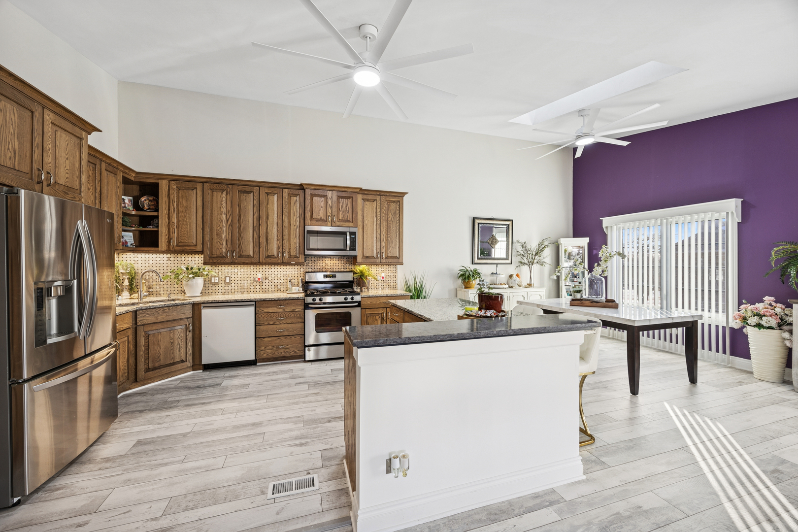 7616 West Saint Francis Road Frankfort, IL 60423 - Photo 7 of 16 a kitchen with a sink appliances and cabinets