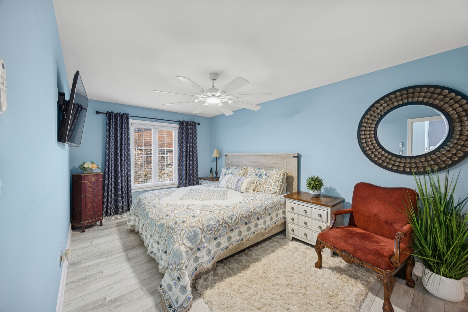 7616 West Saint Francis Road Frankfort, IL 60423 - Photo 9 of 16 a bedroom with a bed chair and a large window