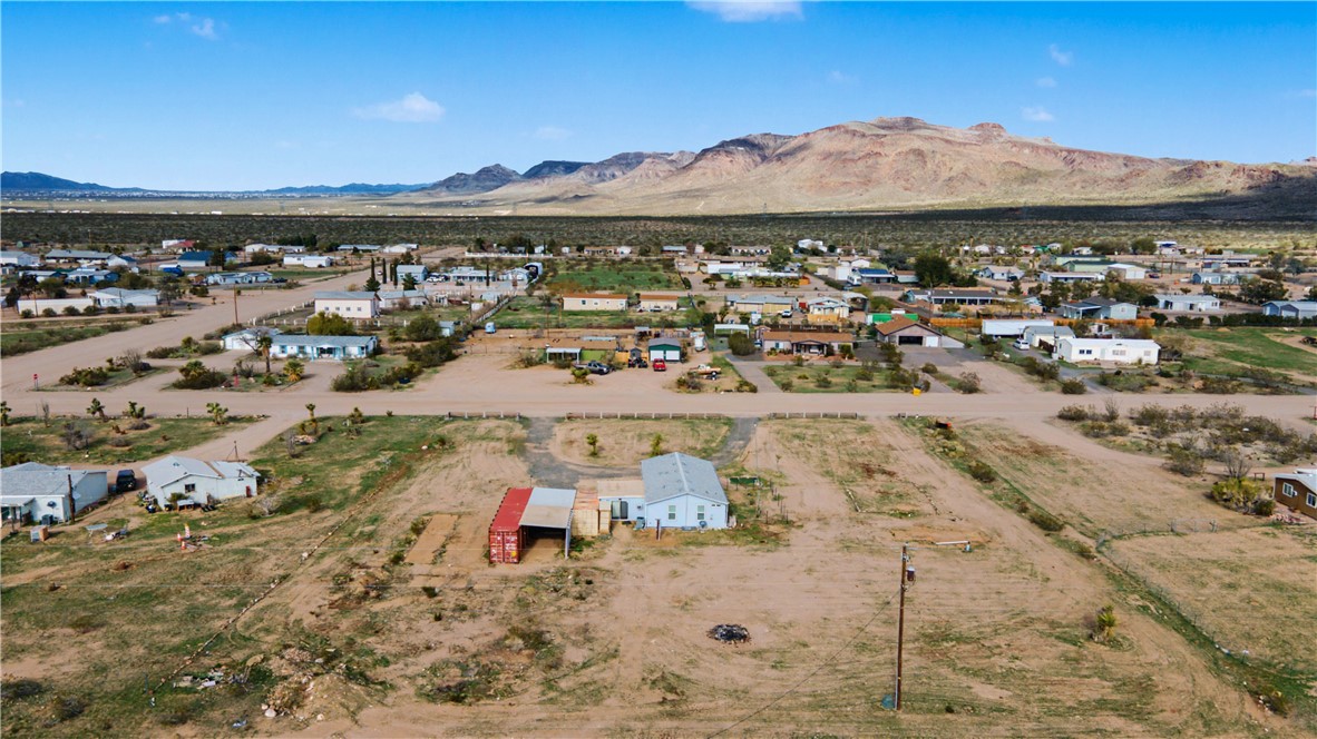 3058 West Carmichael Road Golden Valley, AZ 86413 - Photo 21 of 36 Aerial view of a mountainous background