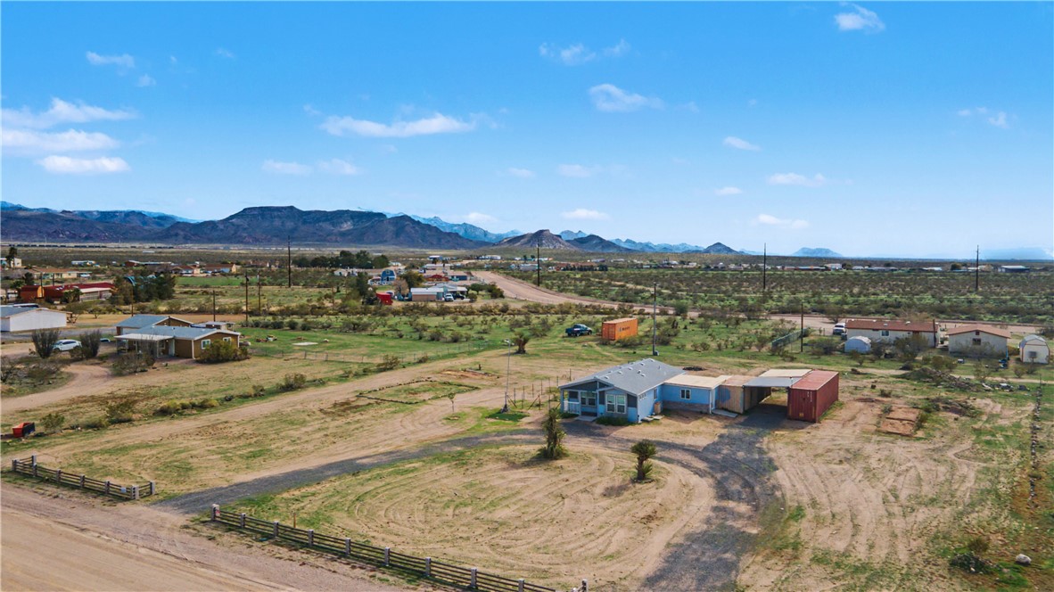 3058 West Carmichael Road Golden Valley, AZ 86413 - Photo 26 of 36 View of rural area featuring mountains