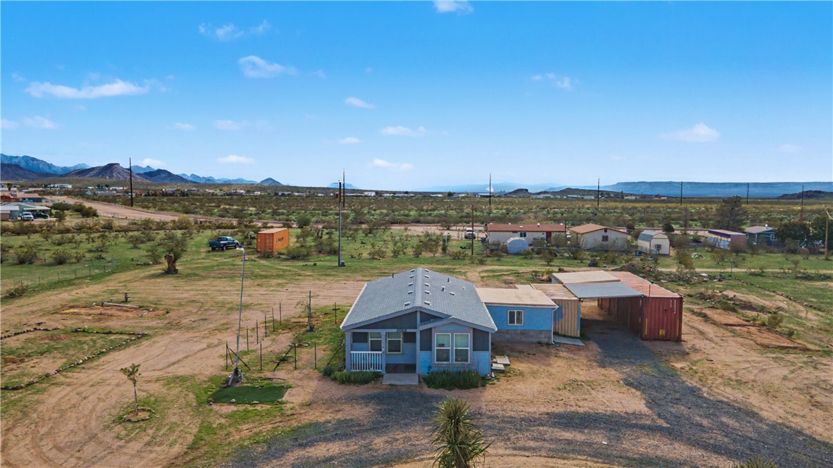 3058 West Carmichael Road Golden Valley, AZ 86413 - Photo 27 of 36 Overview of rural landscape with a mountainous background