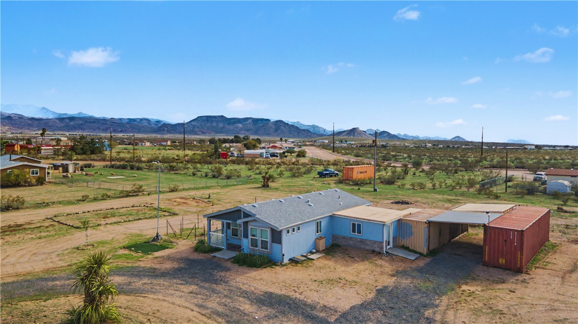 3058 West Carmichael Road Golden Valley, AZ 86413 - Photo 28 of 36 Overview of rural landscape featuring mountains
