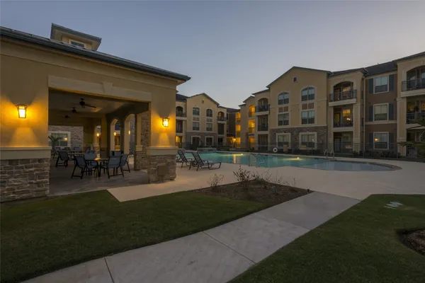 a view of a building with a garden