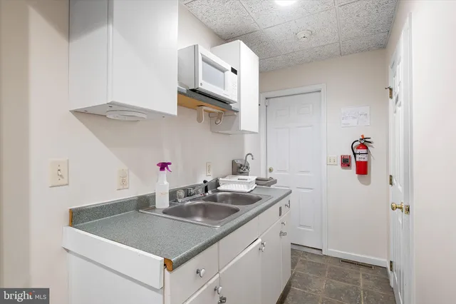 a bedroom with furniture and a bed