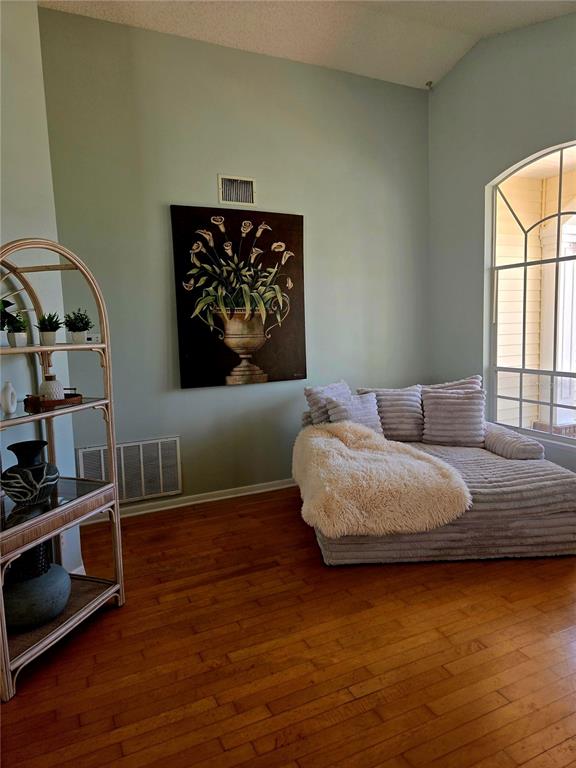 7838 Trail Run Loop New Port Richey, FL 34653 - Photo 3 of 36 a living room with furniture and a flat screen tv