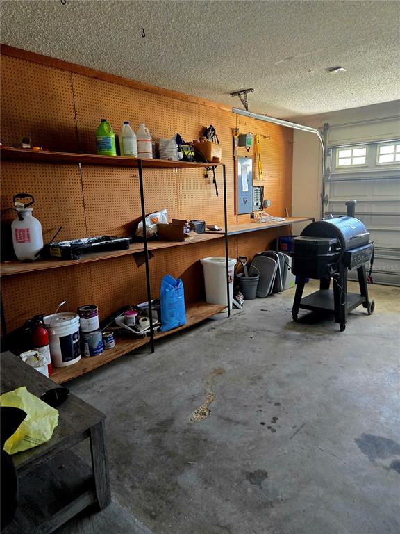 7838 Trail Run Loop New Port Richey, FL 34653 - Photo 31 of 36 a room with storage and a table