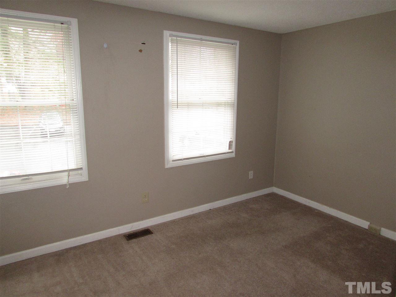 7750 Sandra Lane Raleigh, NC 27615 - Photo 12 of 25 an empty room with a window