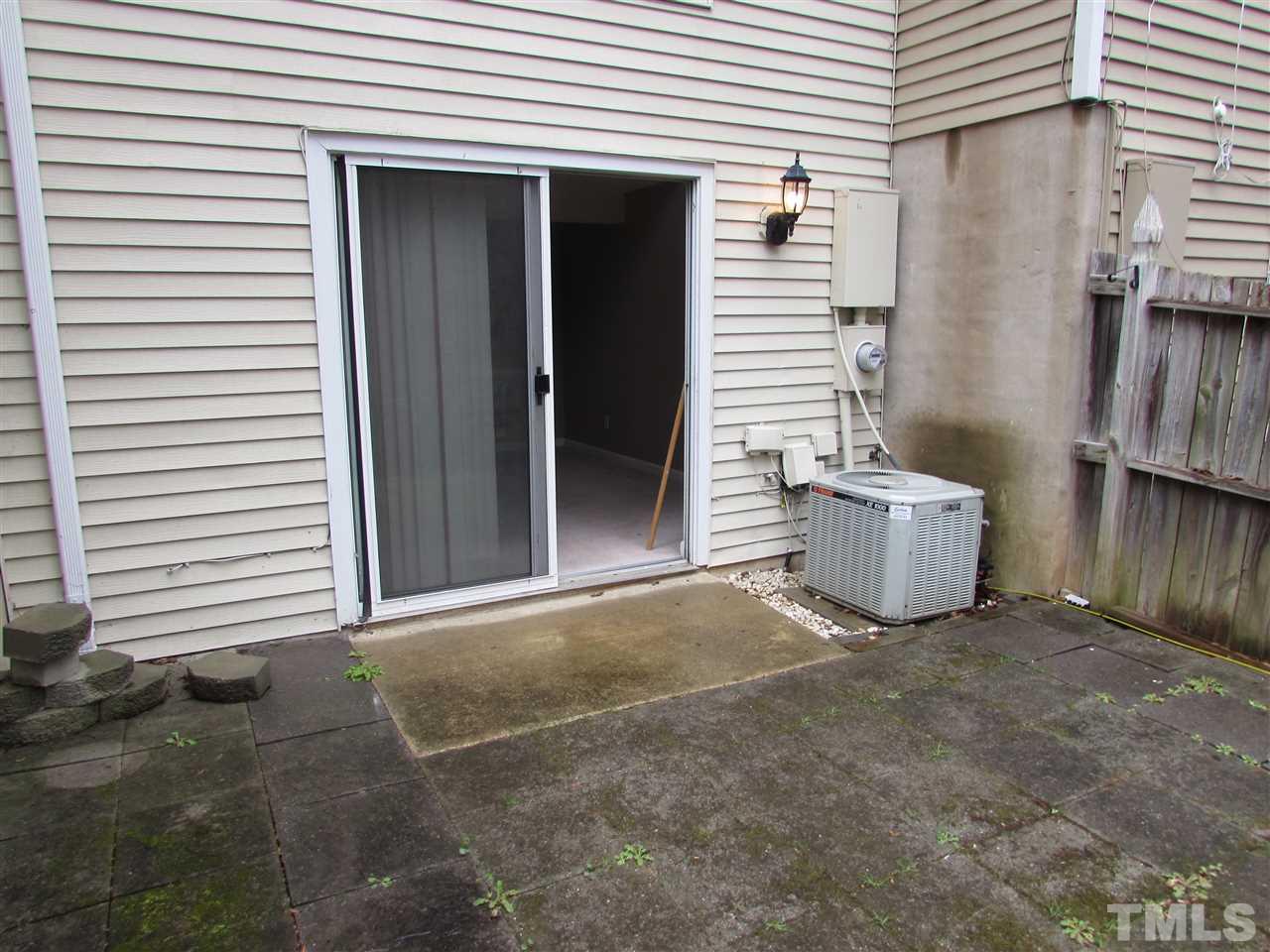 7750 Sandra Lane Raleigh, NC 27615 - Photo 24 of 25 a view of a back yard of the house