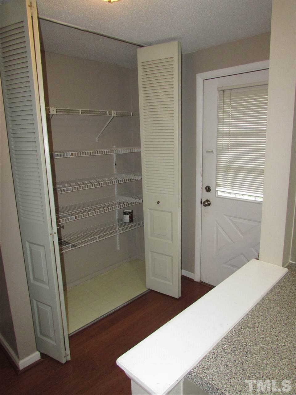 7750 Sandra Lane Raleigh, NC 27615 - Photo 5 of 25 a bathroom with a shower