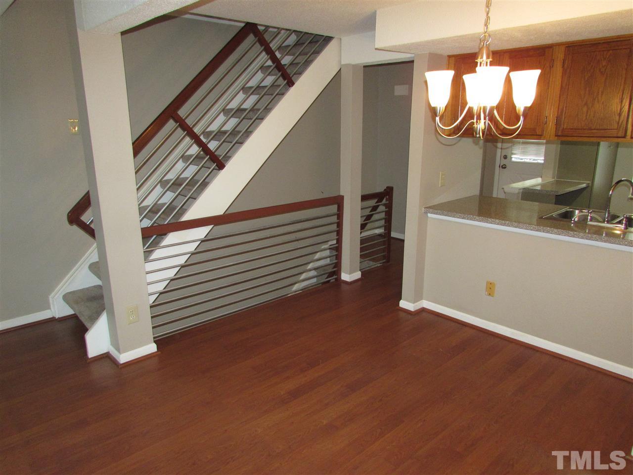 7750 Sandra Lane Raleigh, NC 27615 - Photo 8 of 25 a view of entryway and hall