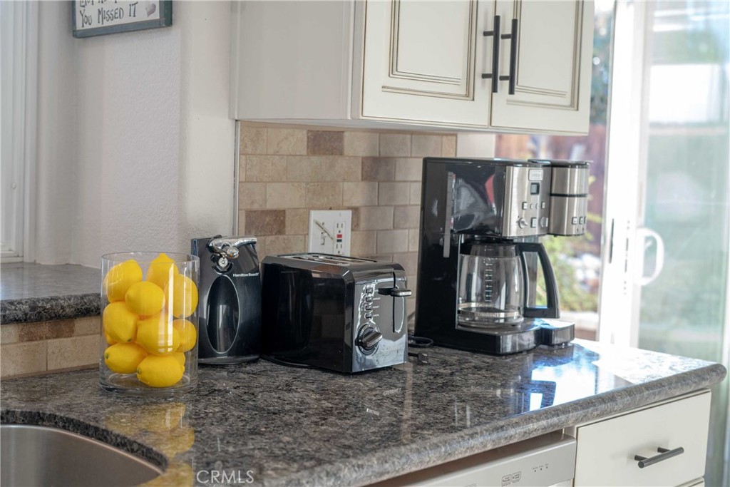 68845 Durango Road Cathedral City, CA 92234 - Photo 23 of 75 a bathroom with a granite countertop sink and a mirror