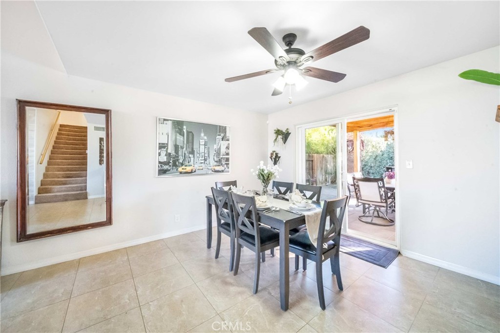 68845 Durango Road Cathedral City, CA 92234 - Photo 28 of 75 a dining room with furniture and window