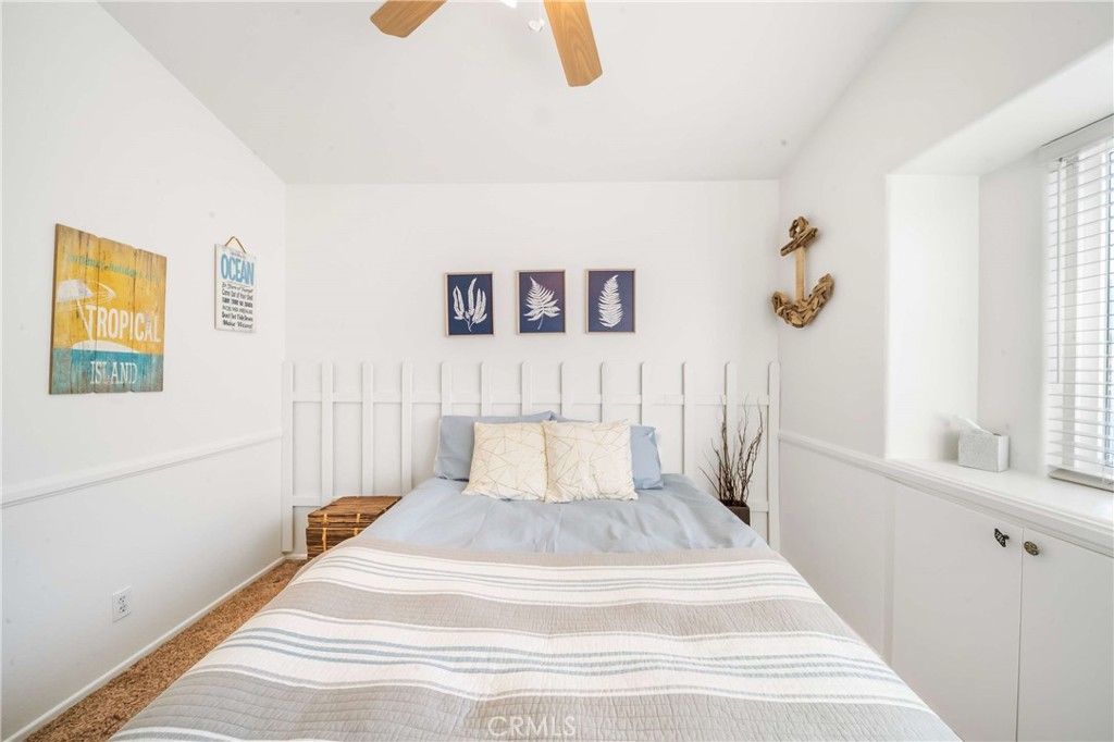 68845 Durango Road Cathedral City, CA 92234 - Photo 43 of 75 a spacious bedroom with a bed and a window