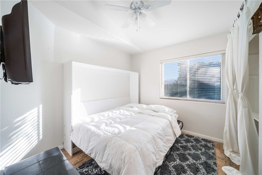 68845 Durango Road Cathedral City, CA 92234 - Photo 45 of 75 a large bed sitting in a bedroom next to a window