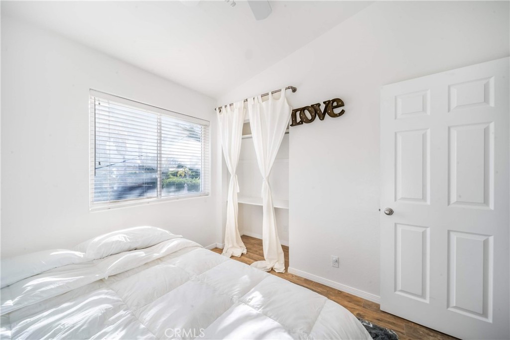 68845 Durango Road Cathedral City, CA 92234 - Photo 46 of 75 a bedroom with a bed and a window with outer view