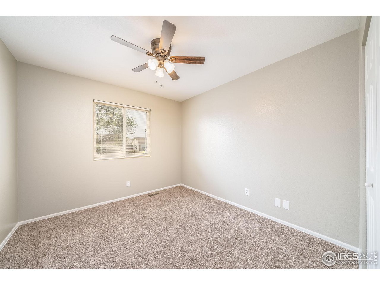 1021 East 25th St Road Greeley, CO 80631 - Photo 9 of 22 a view of an empty room