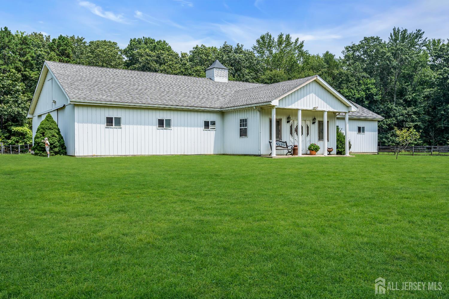 447 Stagecoach Road Millstone Township, NJ 08510 - Photo 13 of 46 a front view of a house with a yard