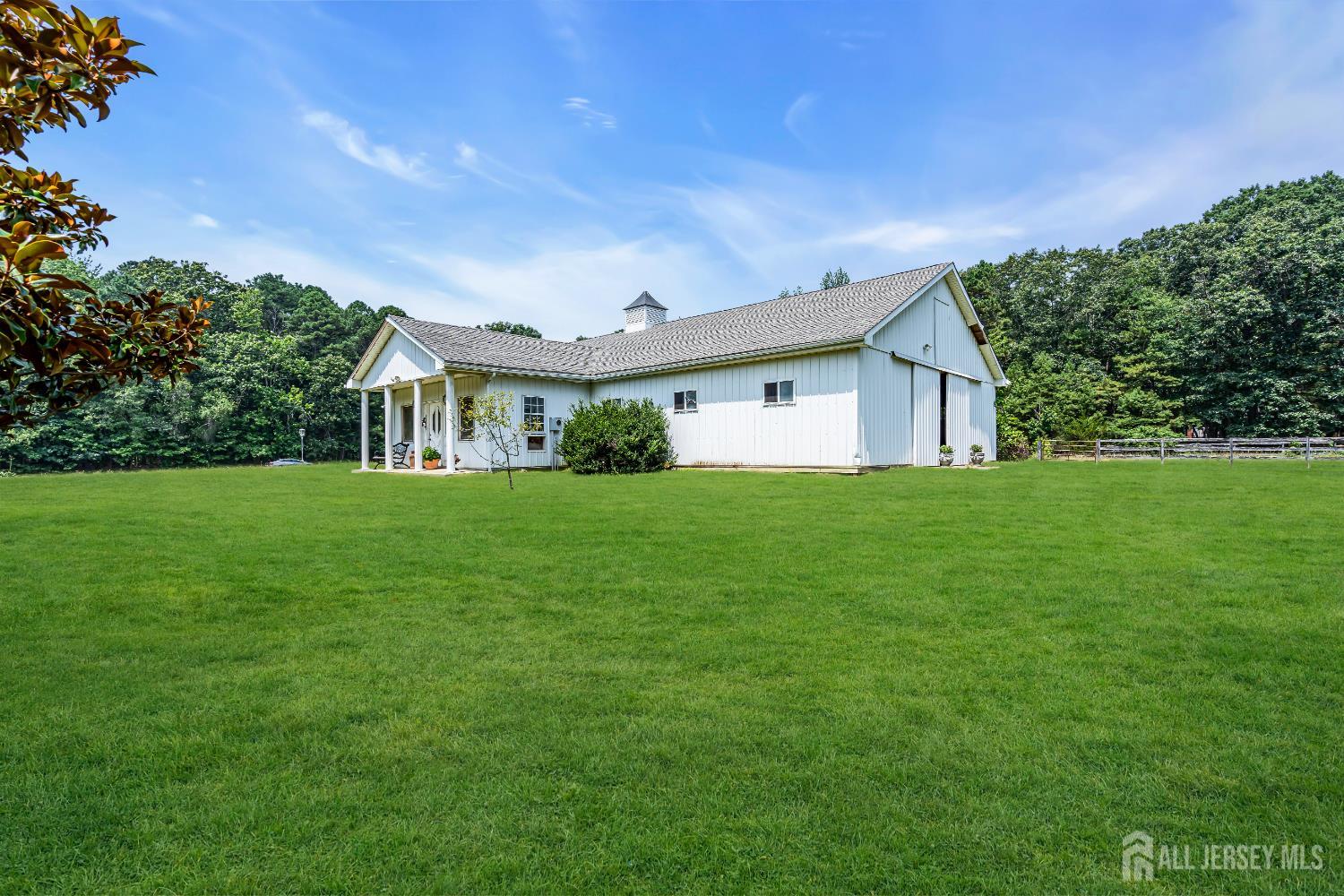 447 Stagecoach Road Millstone Township, NJ 08510 - Photo 14 of 46 a view of house with a big yard