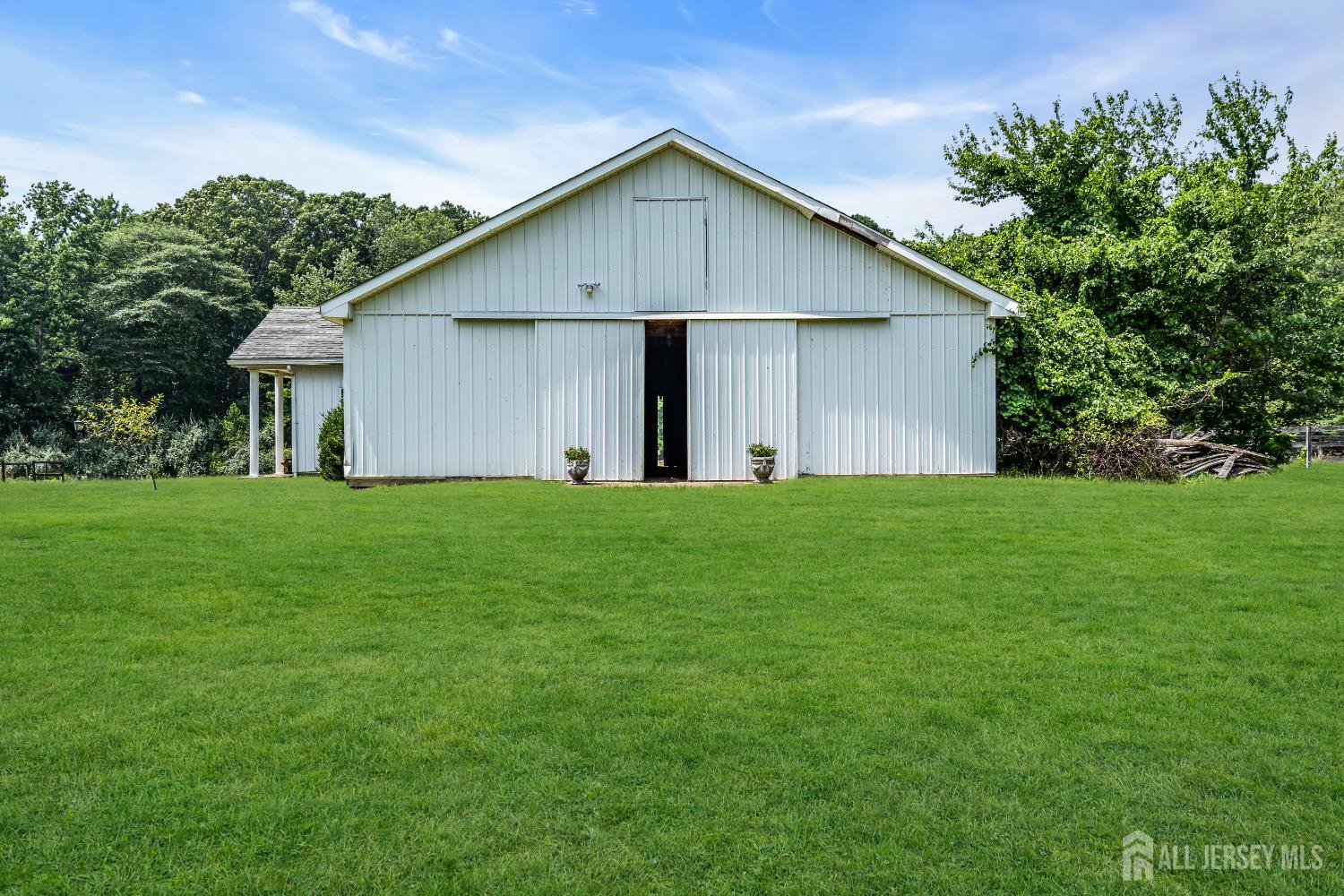 447 Stagecoach Road Millstone Township, NJ 08510 - Photo 15 of 46 a front view of house with yard and green space
