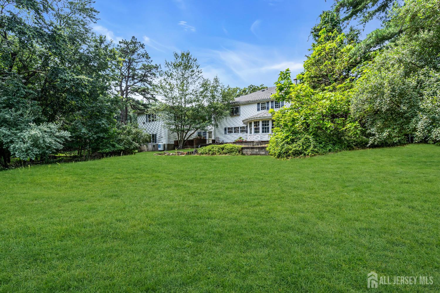 447 Stagecoach Road Millstone Township, NJ 08510 - Photo 18 of 46 a view of a house with a big yard