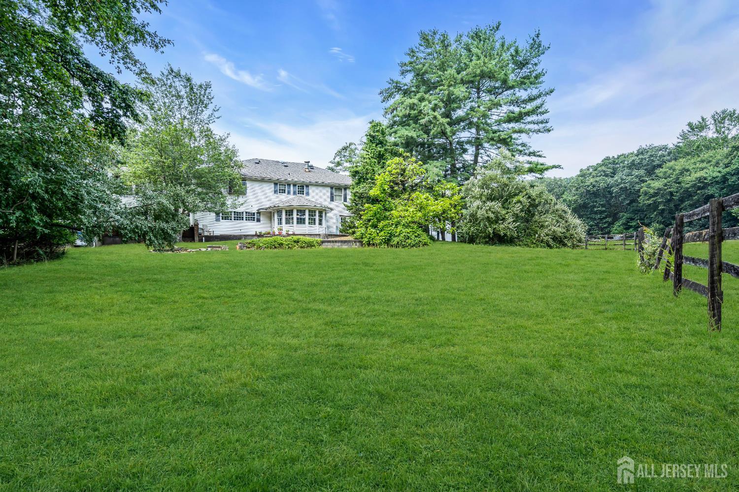 447 Stagecoach Road Millstone Township, NJ 08510 - Photo 19 of 46 a view of a house with a big yard