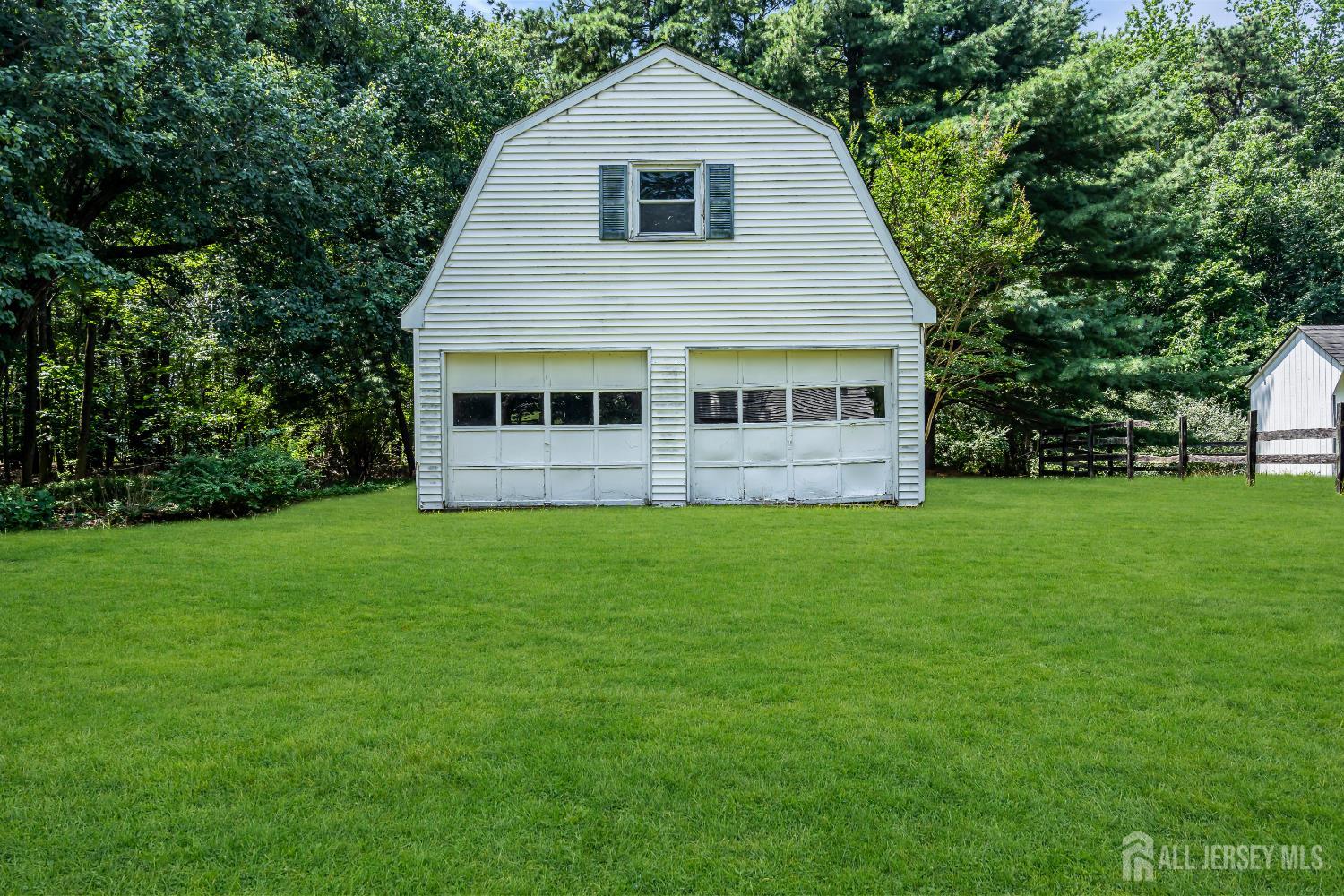 447 Stagecoach Road Millstone Township, NJ 08510 - Photo 21 of 46 a view of house with backyard and garden