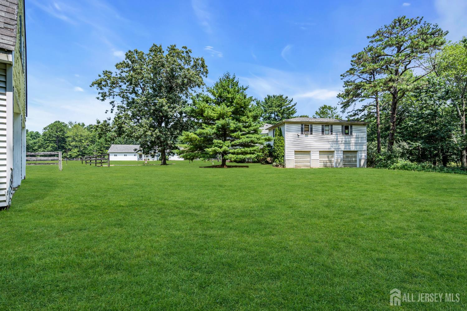 447 Stagecoach Road Millstone Township, NJ 08510 - Photo 23 of 46 a house view with a garden space
