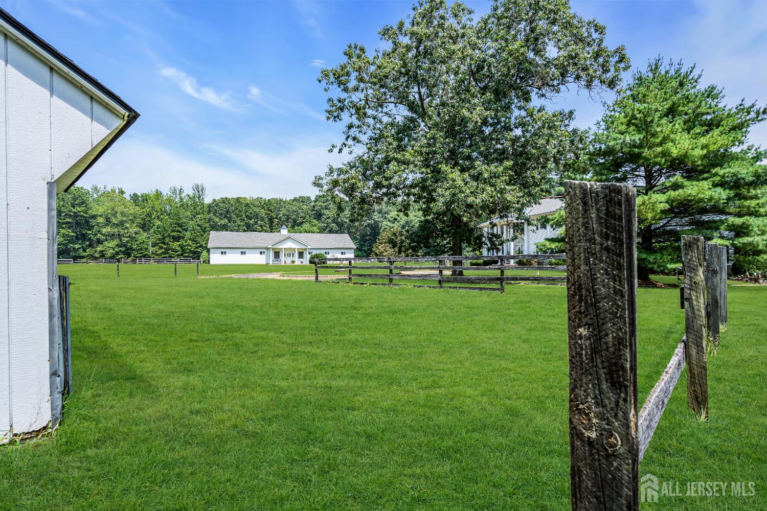 447 Stagecoach Road Millstone Township, NJ 08510 - Photo 24 of 46 a house view with a garden space