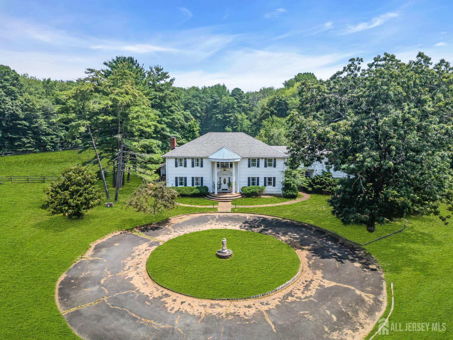 447 Stagecoach Road Millstone Township, NJ 08510 - Photo 25 of 46 a view of a swimming pool with a garden