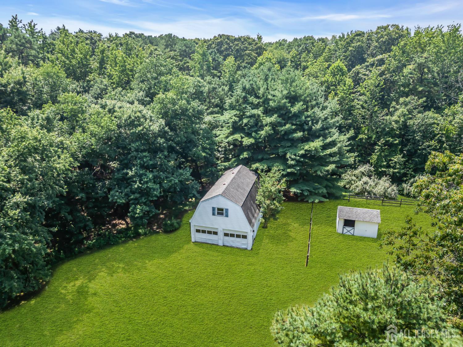 447 Stagecoach Road Millstone Township, NJ 08510 - Photo 27 of 46 an aerial view of a house with a yard